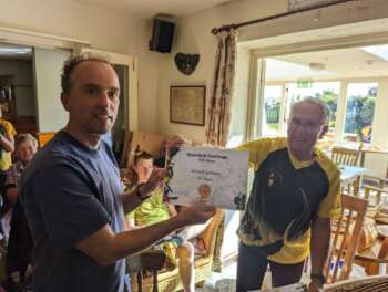 Richard receiving Quantock Challenge full course 3rd place certificate