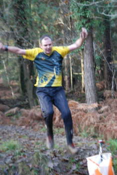 Jeff jumping from a knoll onto the finish, Mallards Pike