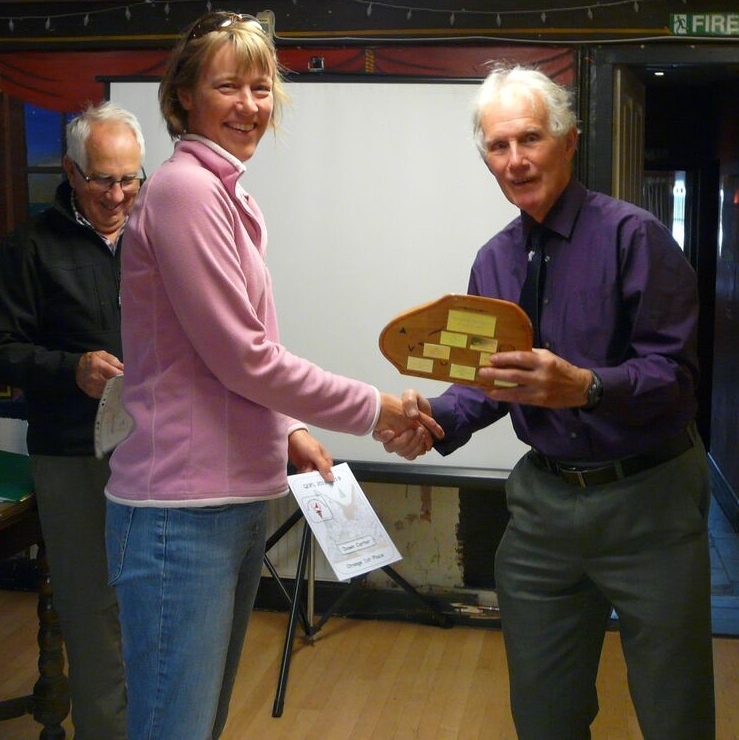 Dawn being awarded a trophy at an AGM